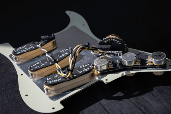 rear view of a Stratocaster Loaded pickguard with Lollar pickups and an Obsidianwire harness shown.