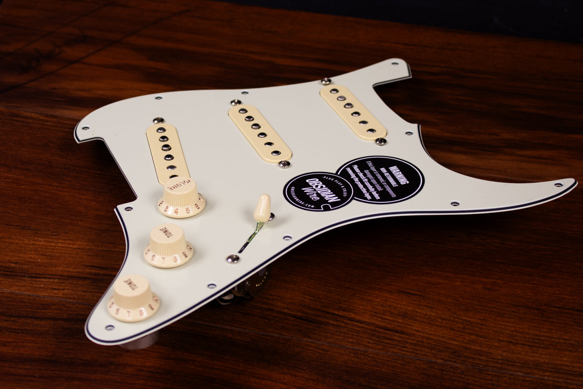 Load video: Installation video for an ObsidianWire custom loaded guitar pickguard for Stratocaster